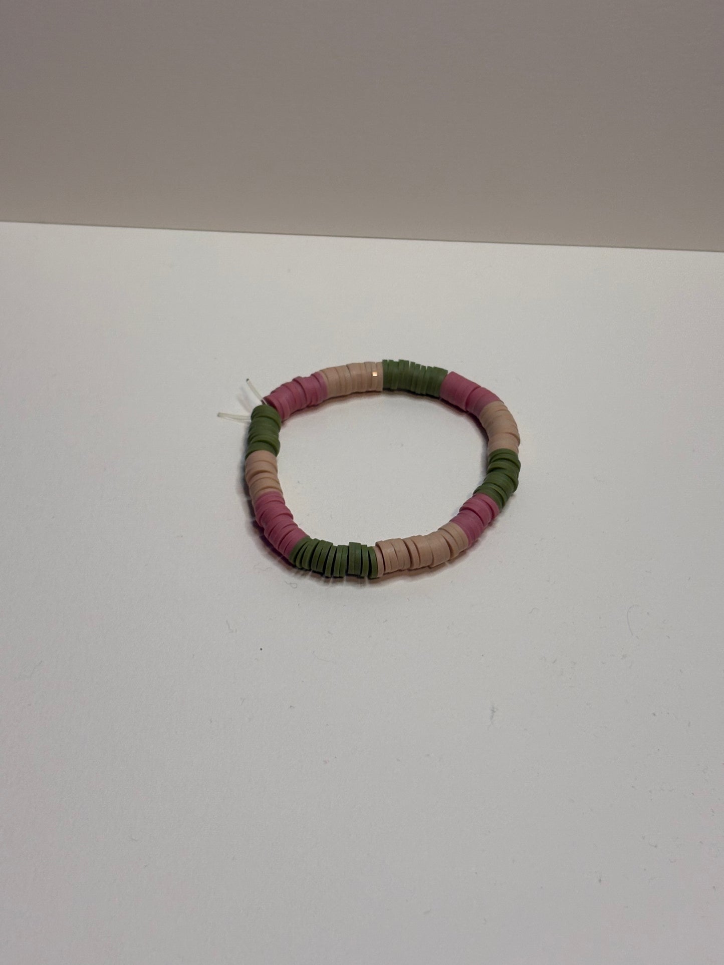 brown pink and green bracelet