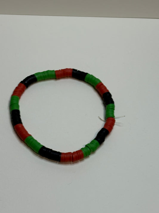 black, green and black bracelet